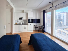 Studio next to train station, 7 mins by train to airport Vantaa